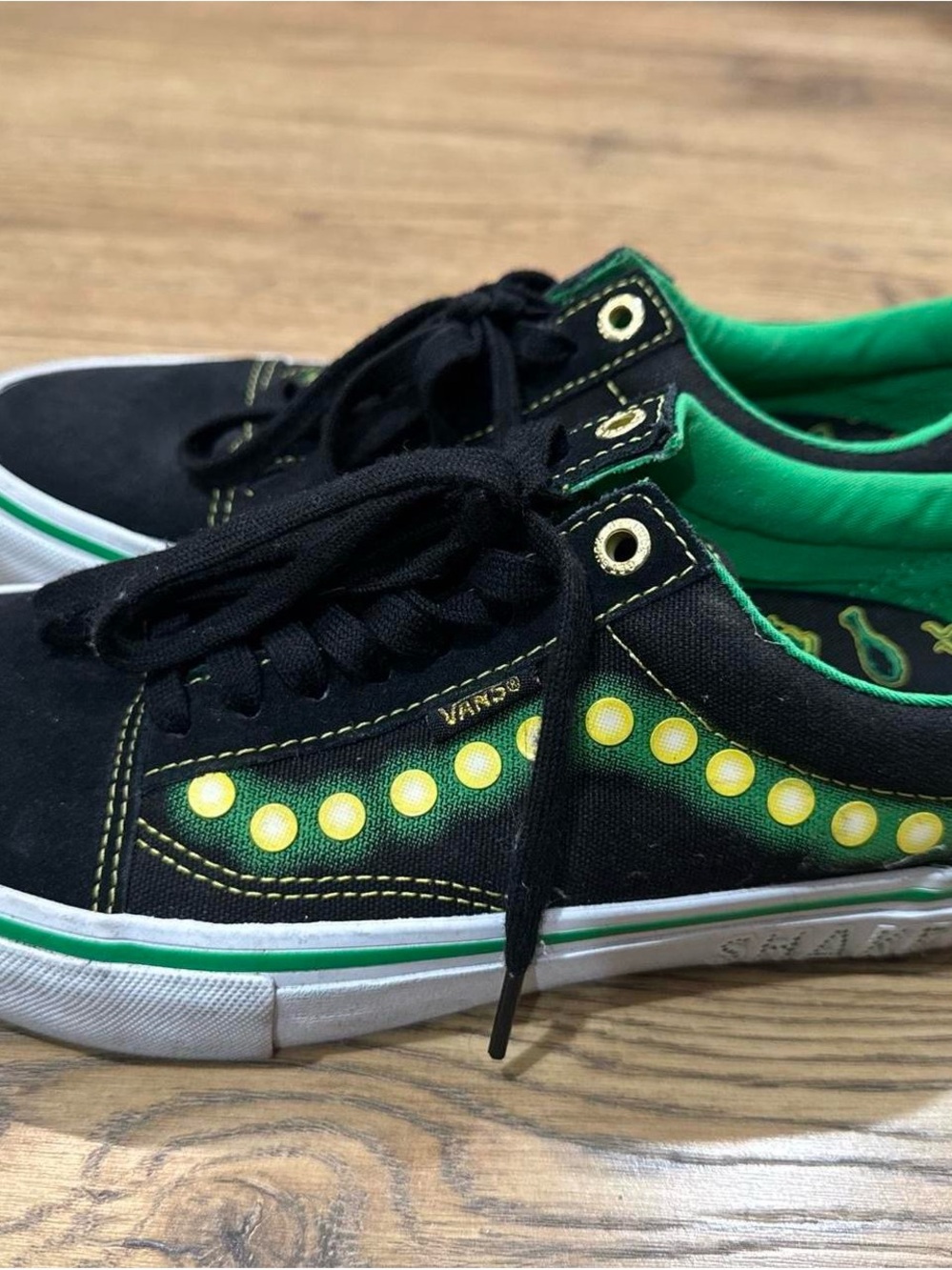 Vans Kids Black Sneakers with Green and Yellow Dot Accents